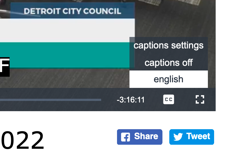 Video player menu with an option for “english”, above the “Captions” or “CC” icon. Both are above social media buttons.