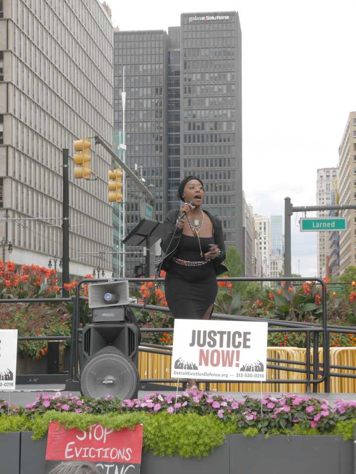 Black woman speaking. 