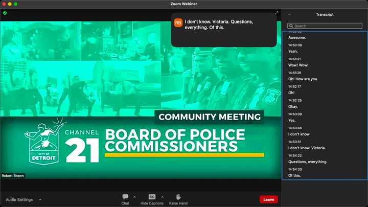 Video feed showing a green photo collage of police officers with text that reads, “Community Meeting. City of Detroit. Channel 21. Board of Police Commissioners.” 