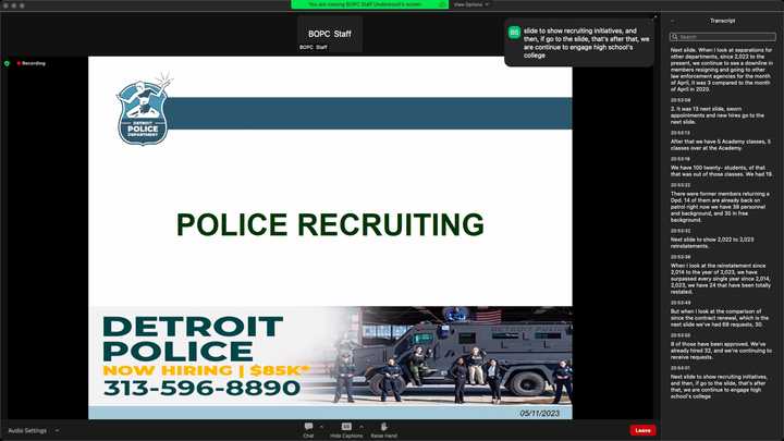 Presentation slide that says, “Police Recruiting.” A graphic says, “Detroit Police. Now Hiring | $85K*. 313-596-8890,” and shows a photo of nine police officers on or in front of a black armored SWAT vehicle. 